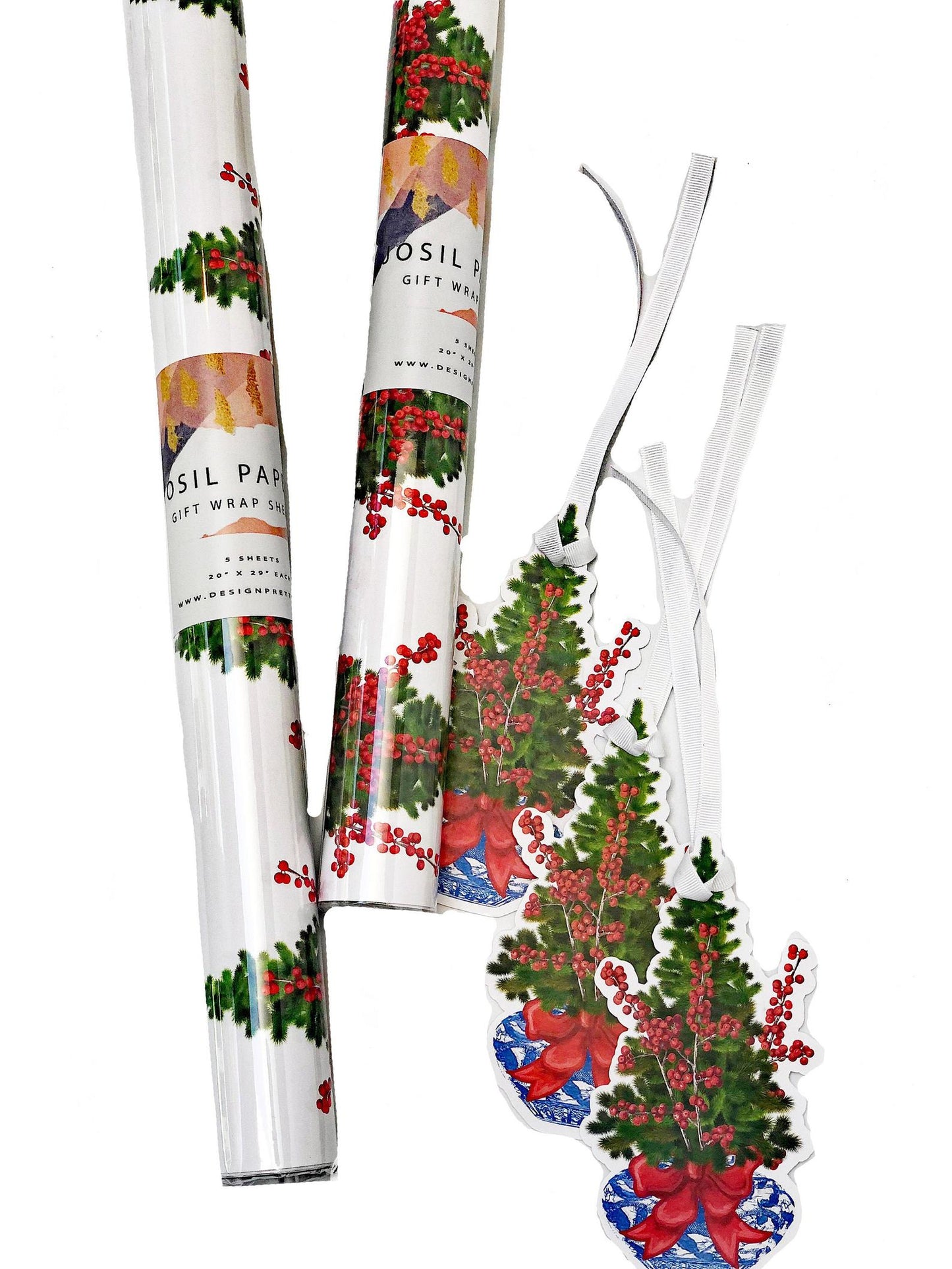 Two rolls of Christmas-themed gift wrap with decorative designs on a white background.