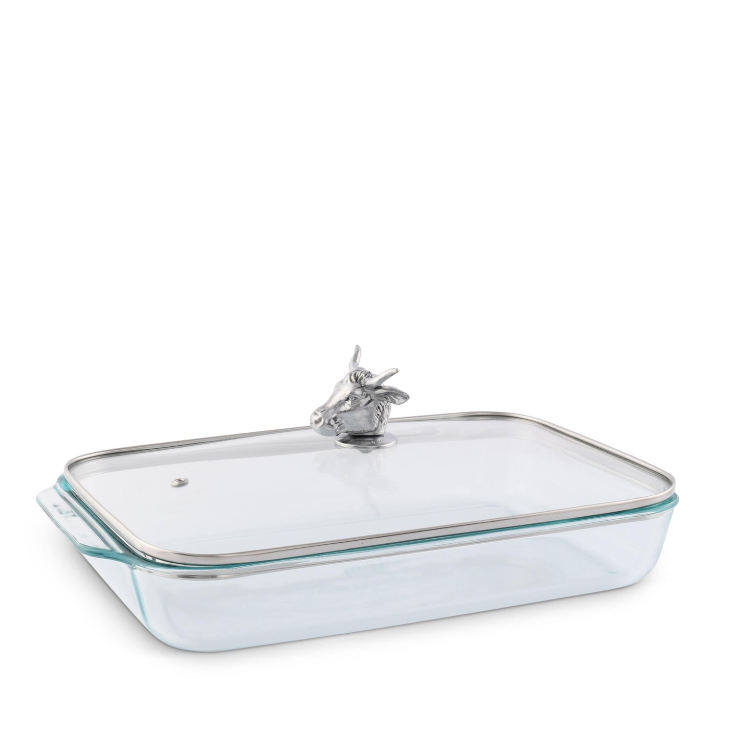 Clear glass baking dish with silver rim and handle on a white background