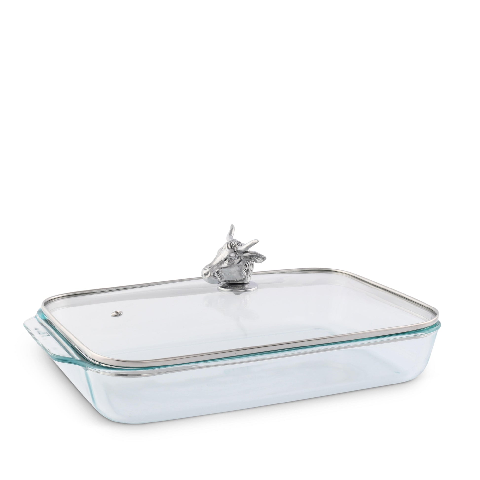 Clear glass baking dish with silver rim and handle on a white background